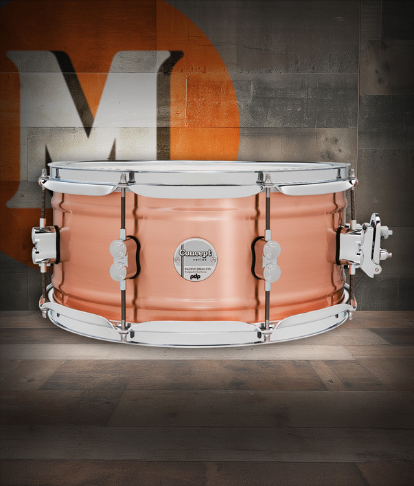 PDP Concept Series 6.5x14 Snare Drum in Natural Satin Brushed Copper finish with 1.2mm shell and chrome hardware, producing warm tone and refined metal resonance.