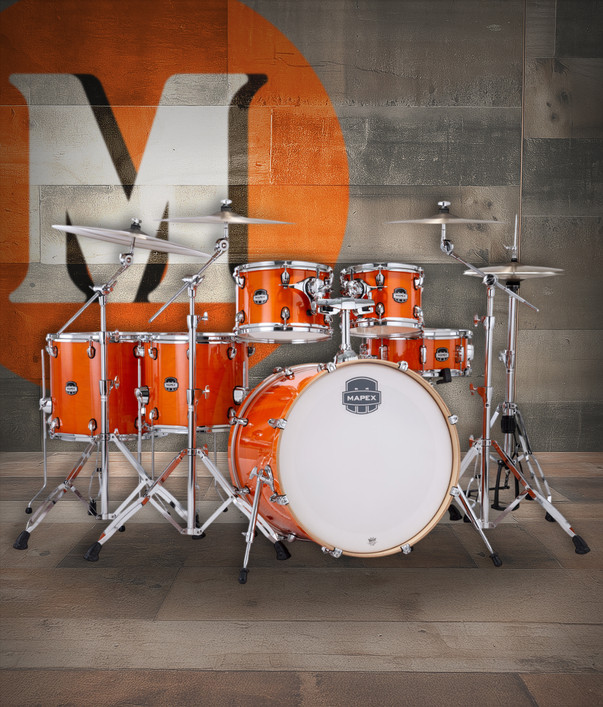 The Mapex Mars Maple MM628SFUOG Studioease Shell Pack features 100% maple shells that deliver warm resonance, smooth mids, and articulate highs. The fast tom Studioease setup enhances responsiveness and tonal clarity, while the Glossy Amber finish provides a striking stage-ready appearance. With SONIClear bearing edges for easier tuning and improved head-to-shell contact, this kit is ideal for versatile drummers performing in studios or on stage.