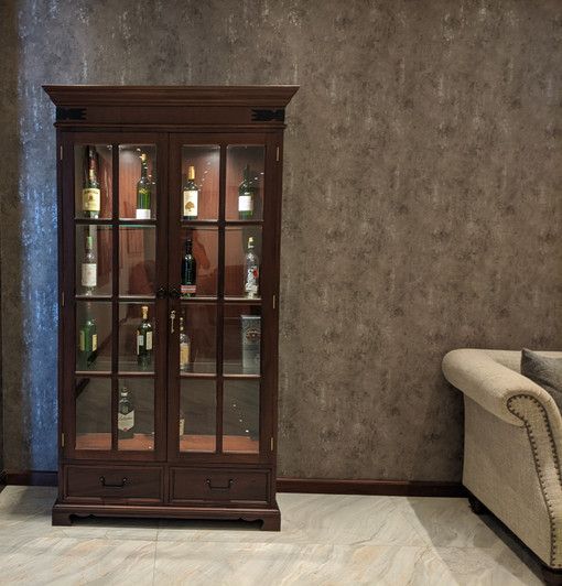 Wood frame display cabinet with tempered glass doors and shelves.