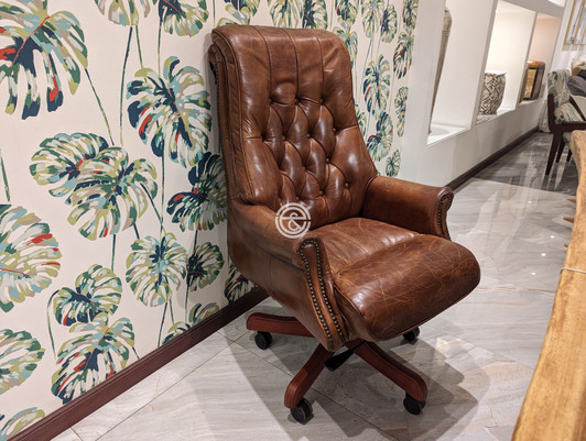 Longhorn Swivel Chair in Vintage Cigar leather Longhorn Swivel Chair in Vintage Cigar leather