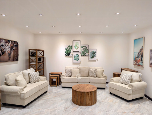 Beige Lincoln six seater sofa with supportive cushions and modern fabric upholstery.