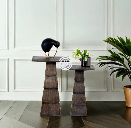 Grey upholstered side stools with pyramid style base