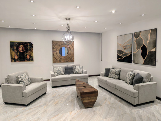 Beige Harold six seater sofa with supportive seating and classic upholstered fabric design.