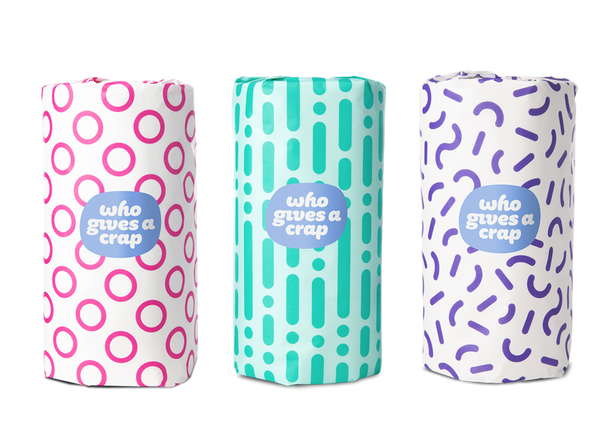 Three colourful rolls of Who Gives A Crap forest-friendly kitchen paper – plastic-free and pattern-wrapped