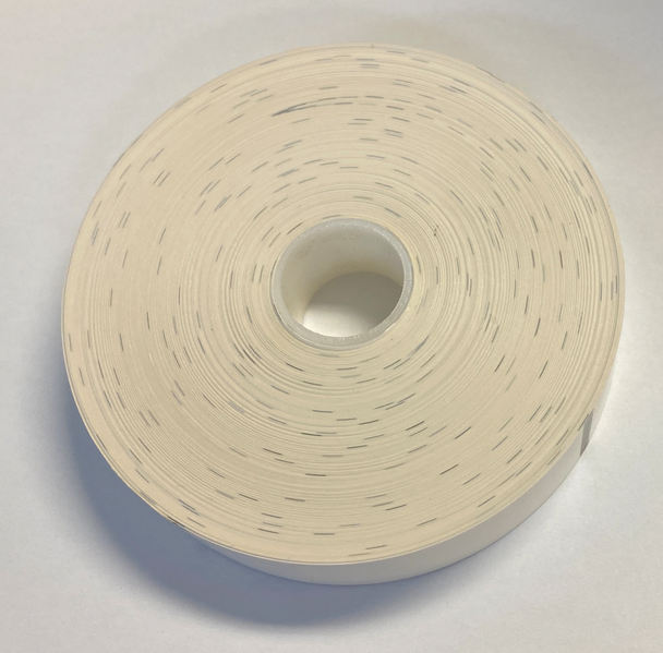 Roll of white wristbands for printing