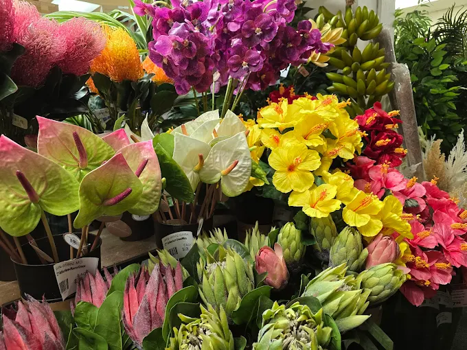 Aisle of silk flowers, vases, and floral supplies at Flora-Dec Sales