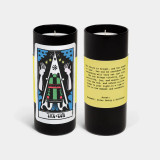 The Sun tarot candle by 54 Celsius showing illustrated tarot artwork on the front and scent and tarot reading text on the back label.