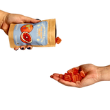 Redeemer Small Batch Blood Orange Gummies being poured into hand, 5mg THC + 5mg CBG per piece, small batch hemp edibles for relaxation Redeemer Small Batch Blood Orange Gummies being poured into hand, 5mg THC + 5mg CBG per piece, small batch hemp edibles for relaxation