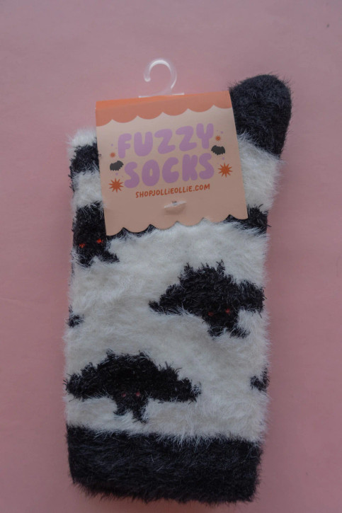 Mothman fuzzy socks styled on white background.