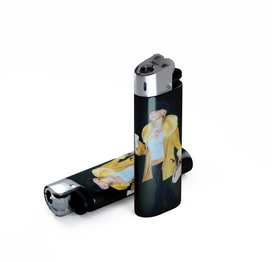 Disposable lighter featuring Britney “Dump Him” shirt pop culture graphic.