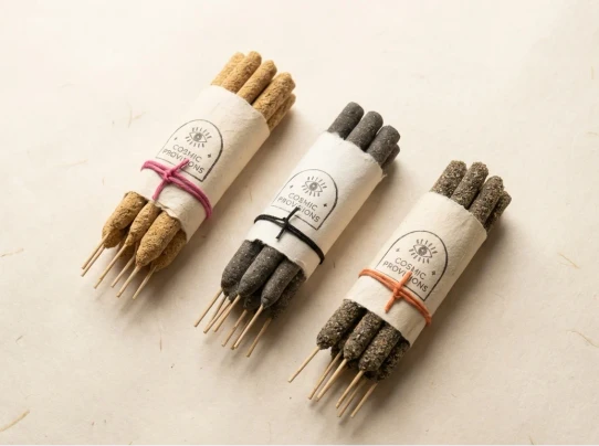 Cosmic Provisions handrolled incense bundles in Palo Santo, Black Copal, and Palo Santo and Myrrh varieties.