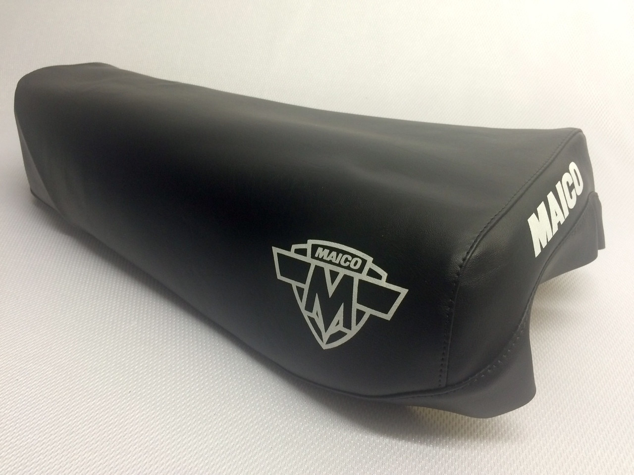 Seat Cover Maico 77-79 Black vinyl with white MAICO on rear and Shield logo on sides.