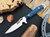 Dawson Knives Smuggler Blue/Black 3.37in Plain Ltd Release Satin Drop Point Front