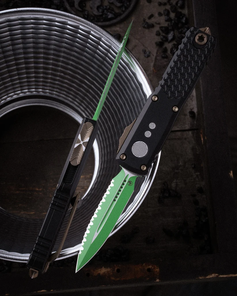 Microtech UTX-85 GEN IV OTF Auto D/E Serrated Jedi Master W/Green Blade Bronze Hardware Black Chassis AUMT123243JM View 9