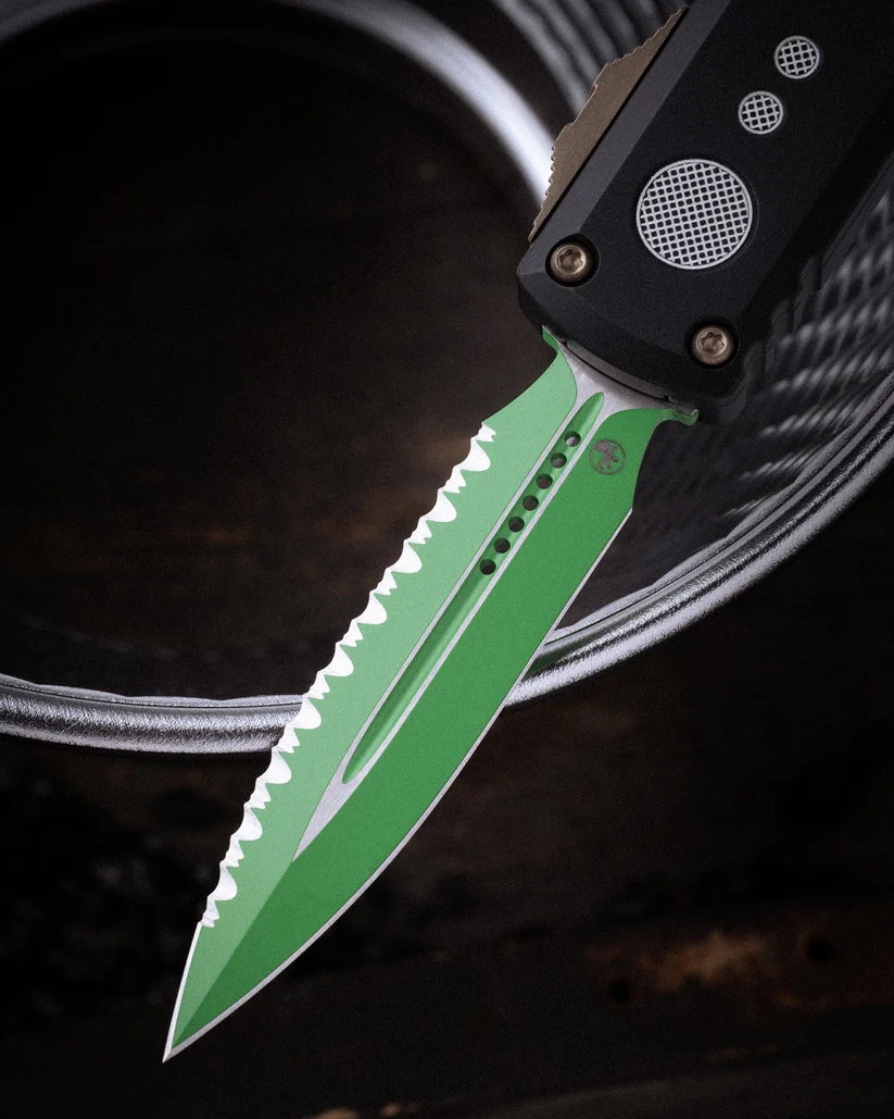 Microtech UTX-85 GEN IV OTF Auto D/E Serrated Jedi Master W/Green Blade Bronze Hardware Black Chassis AUMT123243JM View 8