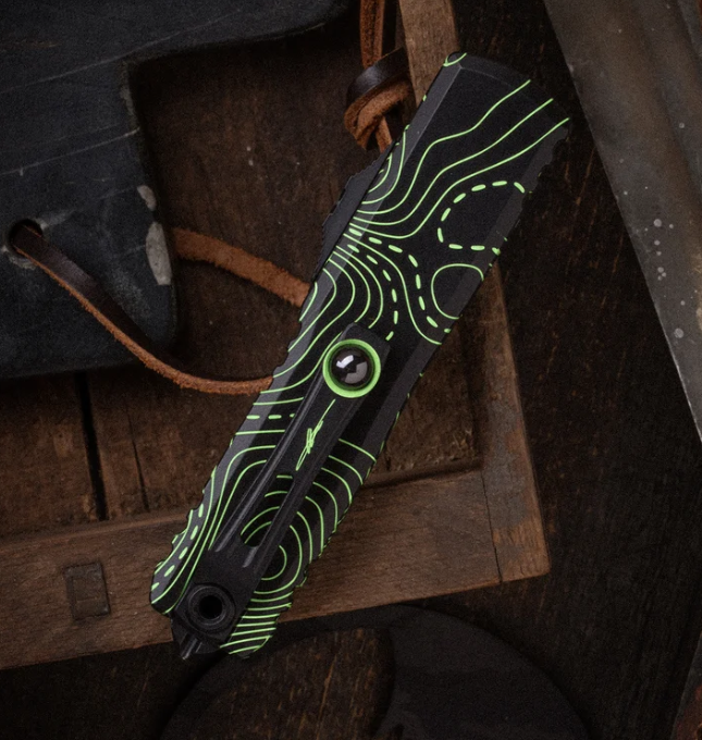 Microtech UTX-85 Gen IV Signature Series OTF Automatic Partially Serrated Topographic Black and Parakeet Green Camo S/E AUMT123142TPBKPGCS View 10