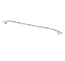 Crystal cabinet pull with a modern bow design on a white drawer