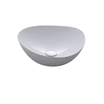 TOTO Kiwami asymmetrical vessel lavatory in a high-gloss Cotton White finish