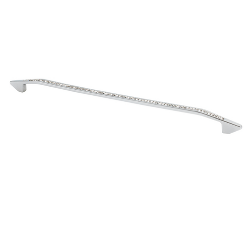 Crystal cabinet pull with a modern bow design on a white drawer