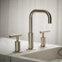 Kohler Purist®Widespread bathroom sink faucet with low lever handles and low gooseneck spout in Vibrant Brushed Nickel