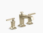 Kohler Margaux®Widespread bathroom sink faucet with lever handles in Vibrant French Gold