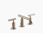 Kohler Purist®Widespread bathroom sink faucet with low lever handles and low spout in Vibrant Brushed Bronze