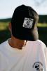 calvert-supply-black-trucker-cap