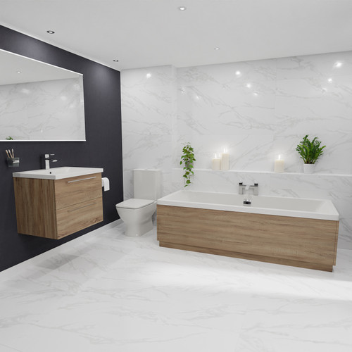 A modern bathroom suite including straight double ended bath, vanity unit and close coupled toilet with taps and waste