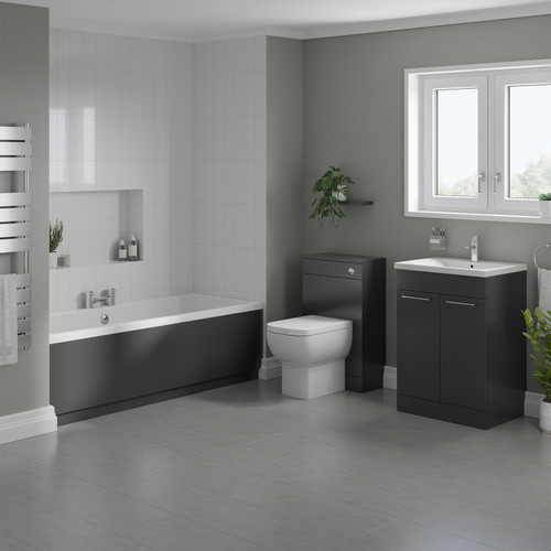 A modern bathroom suite including slim edge straight double ended bath, toilet and basin furniture set