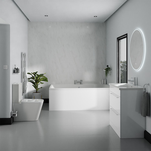 A modern bathroom suite including straight double ended bath, vanity unit and close coupled toilet