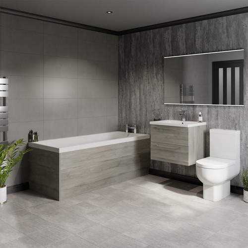 A modern bathroom suite including straight single ended bath, vanity unit and close coupled toilet