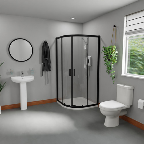 A modern bathroom suite including quadrant shower enclosure, shower tray, basin, pedestal and close coupled toilet