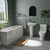 A modern bathroom suite including straight single ended bath, basin, pedestal and close coupled toilet with taps and waste