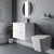 A modern vanity and toilet suite including concealed cistern and flushplate