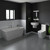 A modern bathroom suite including double ended back to wall freestanding bath, basin, pedestal and close coupled toilet