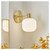 Forum Spa Scala Satin Brass Ribbed Bathroom Wall Light Lifestyle Illuminated thumbnail