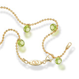 Yellow gold bracelet with peridot