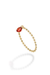Yellow gold ring with red garnet