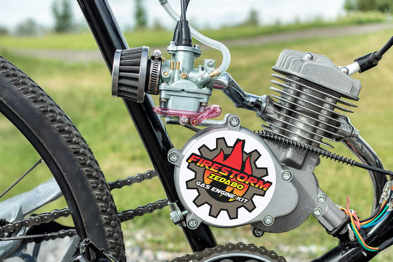 Performance carburetor mounted on motorized bicycle engine