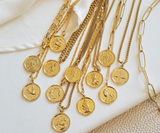 MAKE IT MEANINGFUL | Shop Zodiac Coins, Letters, & Lockets