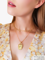 Woman Wearing A Gold Bottle Cap Chain Necklace And A Gold Filled Necklace Layered With Sun Charm | Mojo Supply Co