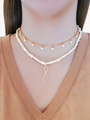 Woman Wearing Two Gold Filled Necklaces Layered With Pearls And Gold White Ribbon Tie Charm | Mojo Supply Co