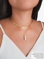Woman Wearing A Gold Sunburst Chain Necklace, A Gold Paperclip Necklace And A Dainty Gold filled Necklace Layered With A Gold Three-Stone CZ Pendant | Mojo Supply Co