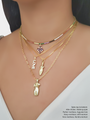 Woman Wearing A Multi-Colored Choker Layered With Purple CZ Charm And Three Gold Plated Necklaces Layered With Two Gold Body Figure Pendants And A Letter LOVE Pendant | Mojo Supply Co