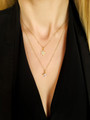 Woman Wearing Gold Filled Layering Necklaces With Opal Star Pendant And CZ Diamond Pendant