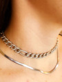 Woman Wearing Chunky Silver CZ Pave Necklace Choker and Silver Herringbone Snake Necklace. | Mojo Supply Co