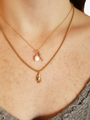 Woman Wearing Helena Perfectly Okay Gold Hand Necklace Pendant