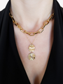 Woman Wearing Zora Gold Oval Textured Connector Necklace Pendant