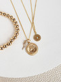 Collection Of Dainty Gold Jewelry Pieces Including Ayleen Beaded Bracelet, Sloane Necklaces Accentuated With Adisa Cornicello Gold Horn Pendant, Fiona St. Christopher Gold Coin Pendant And Paige Opal Golden Round Charm | Mojo Supply Co
