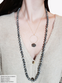 Woman Wearing Layering Necklaces Including Gray Whitley Long Beaded Necklace And Sloane Necklace Accentuated With Gray Oaklee Natural Stone Pendant | Mojo Supply Co